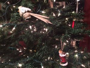 bird with carols written on its wings (from the British library) and bird on a post box (from Westminster Abbey)
